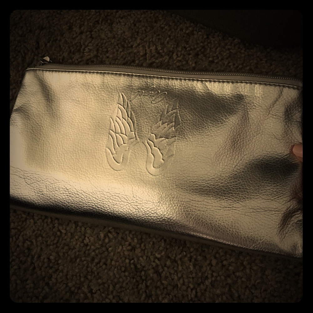 VS silver clutch or Make up bag